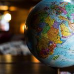 Photo of world globe sitting on a desk
